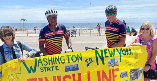 Ray Wittmier and friends standing at the finish line