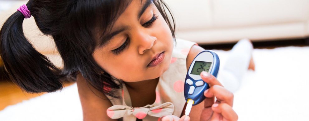 child playing with thermometer