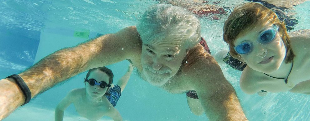 people swimming in pool