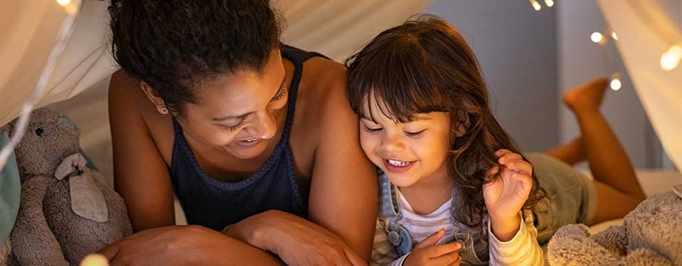 Image of woman and child camping